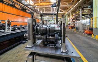 Roller forming machine. The interior of the plant producing a metal profile.